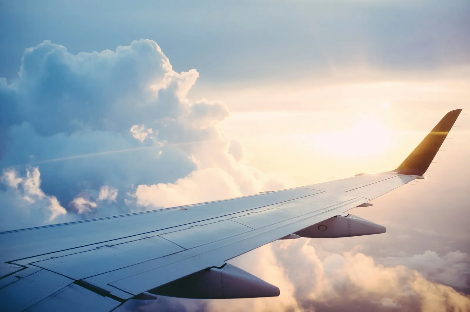 Wing over the clouds